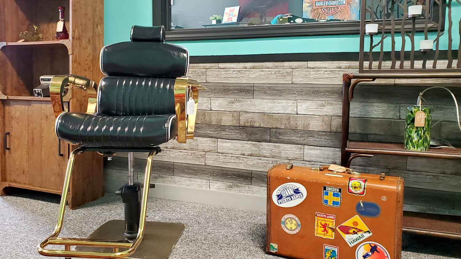 Vintage beauty chair, suitcase, collectibles, and decor.