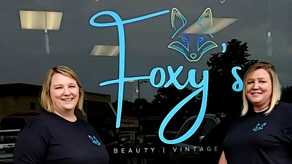 Ashley and Charlene outside the Foxy's storefront.