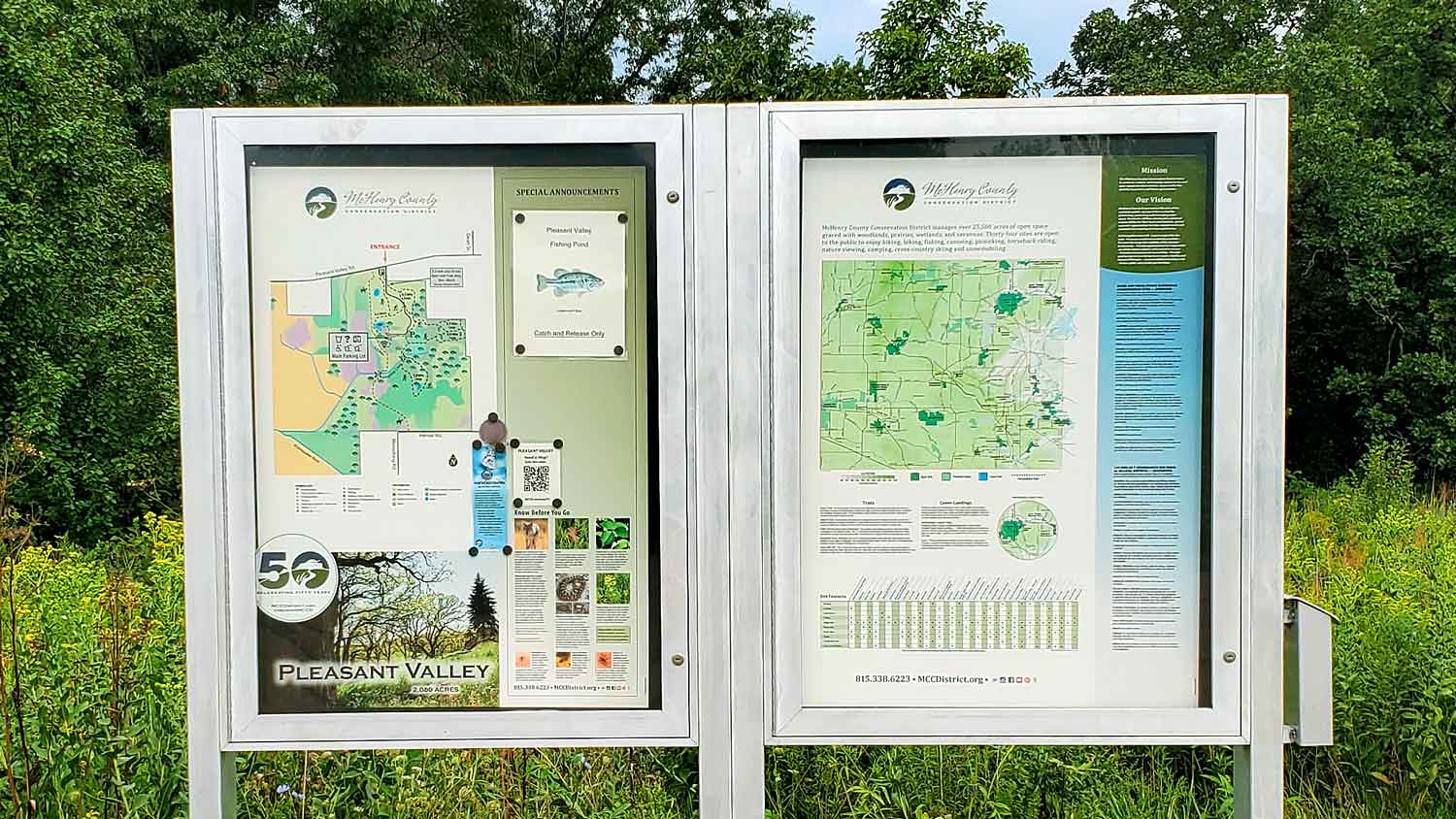 Maps and bulletin board near the main parking lot at the Pleasant Valley Conservation Area.