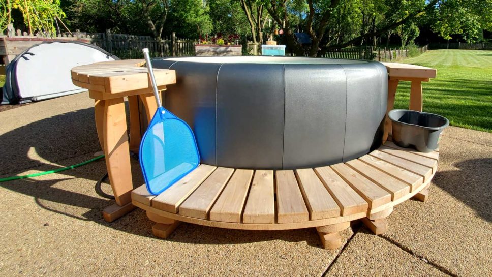CHILLnTUB hot tub installation with wooden step.