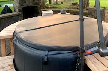 CHILLnTUB hot tub set up on outdoor patio hardscape.