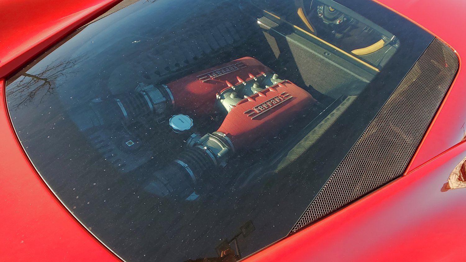 Ferrari windowed engine bay.