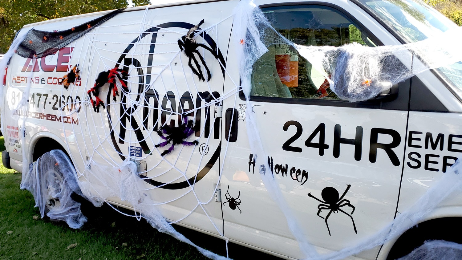 Ace Heating and Cooling van with Halloween decorations.