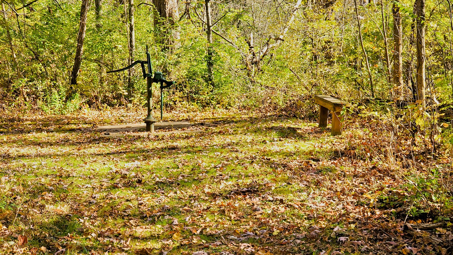 Water pump and bench at Rush Creek Conservation Area.