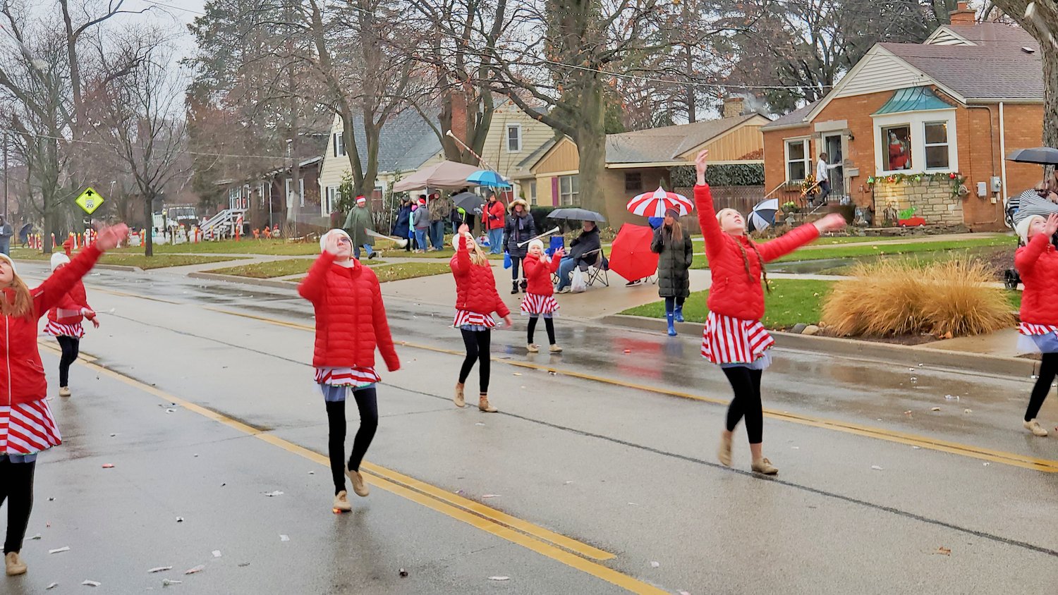Sparklers Twirl Team parade marchers.