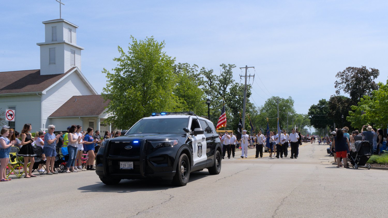Huntley police cruiser leading off the Memorial Day parade.