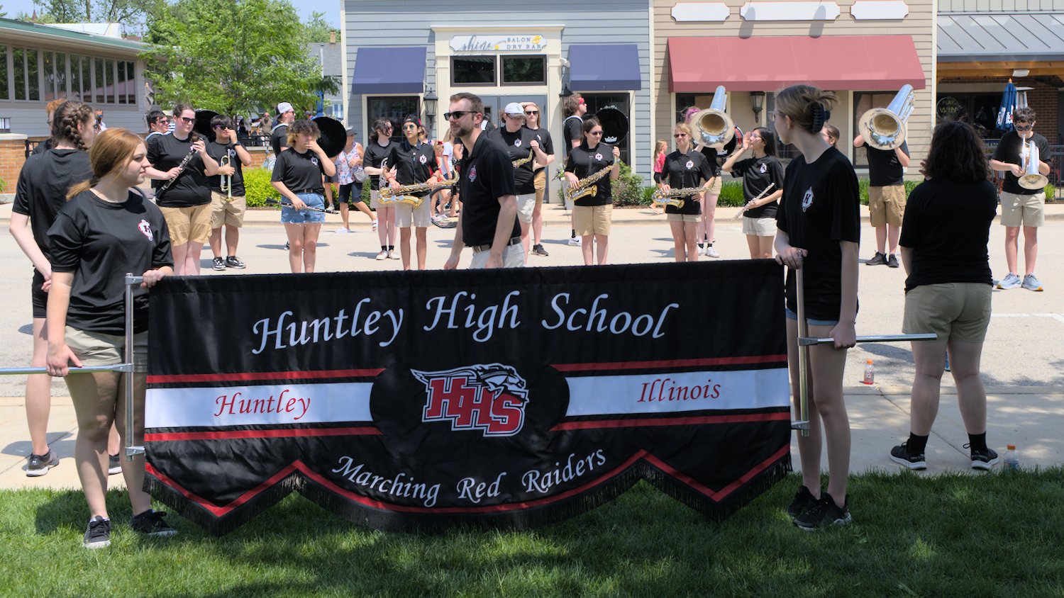 Huntley High School marching band readies for Memorial Day ceremony.