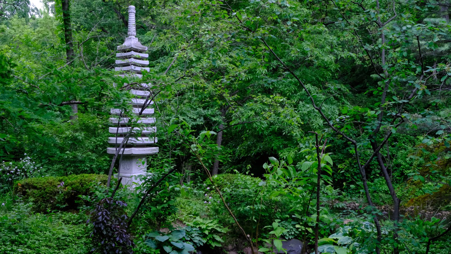 Pagoda standing amongst the greenery.