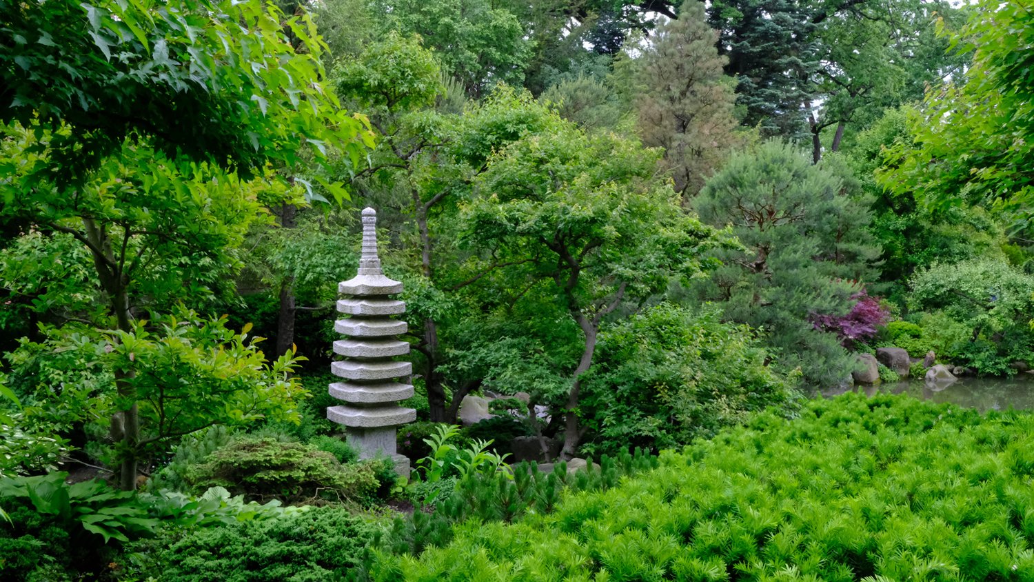 Pagoda near a waterfall.