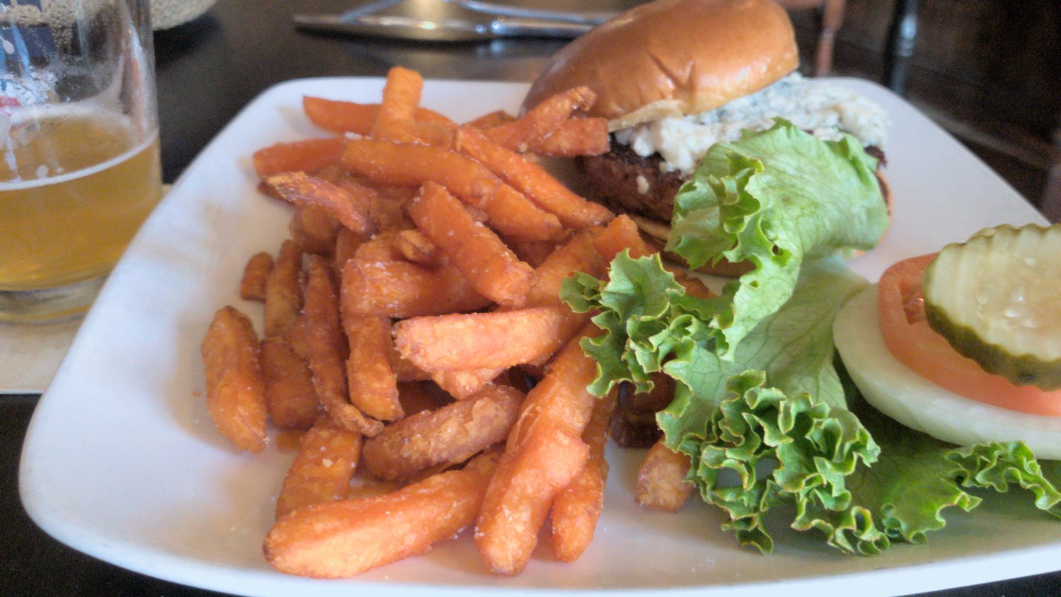 "Beyond Burger" with blue cheese and sweet potato fries.