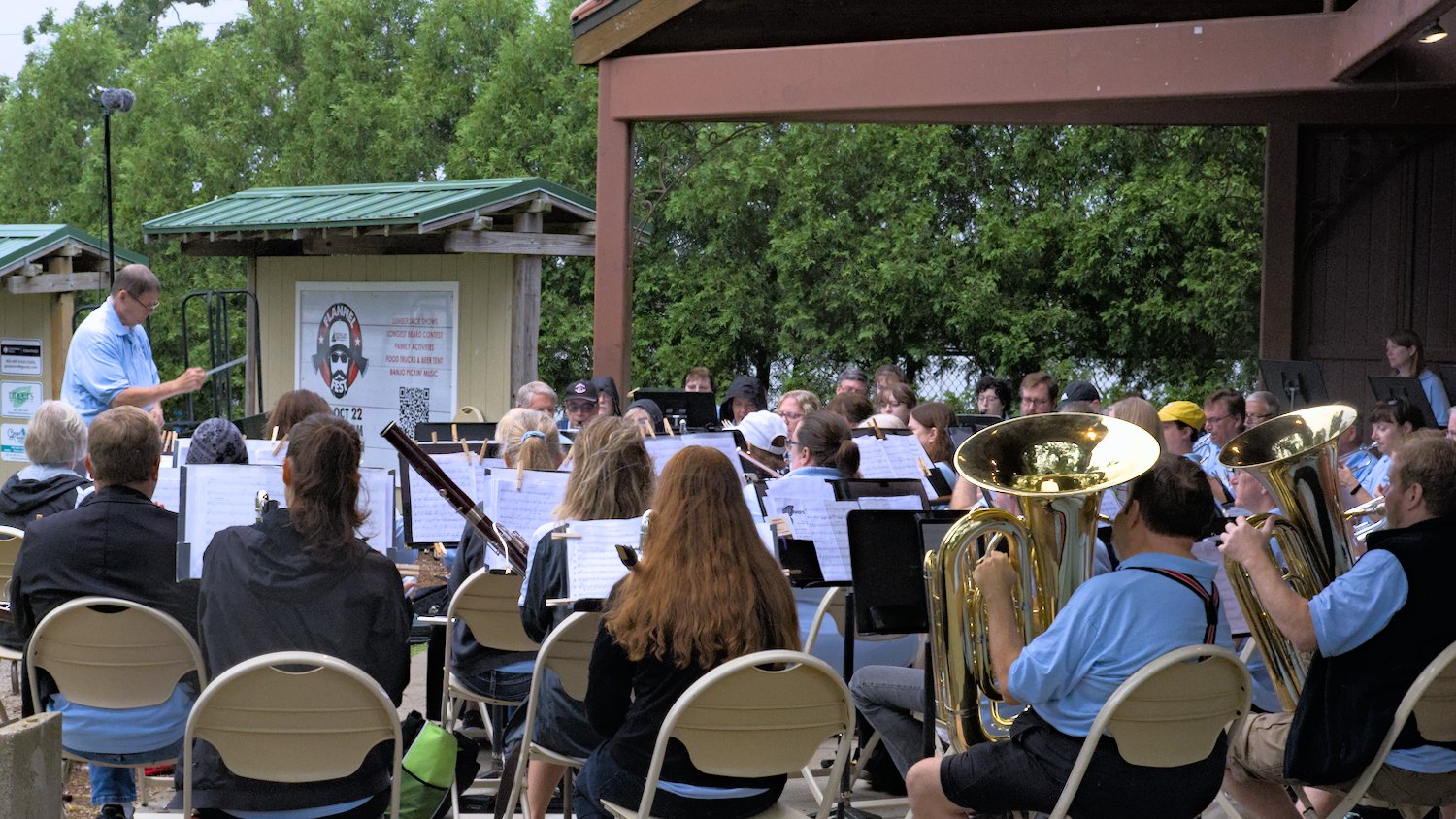 Crystal Lake Community Band performing in the drizzle.