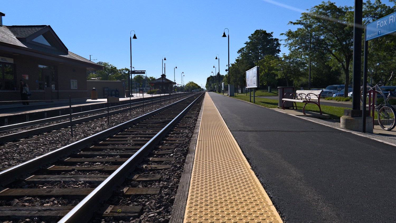 View of the tracks and platform at the Fox River Grove Metra train station.