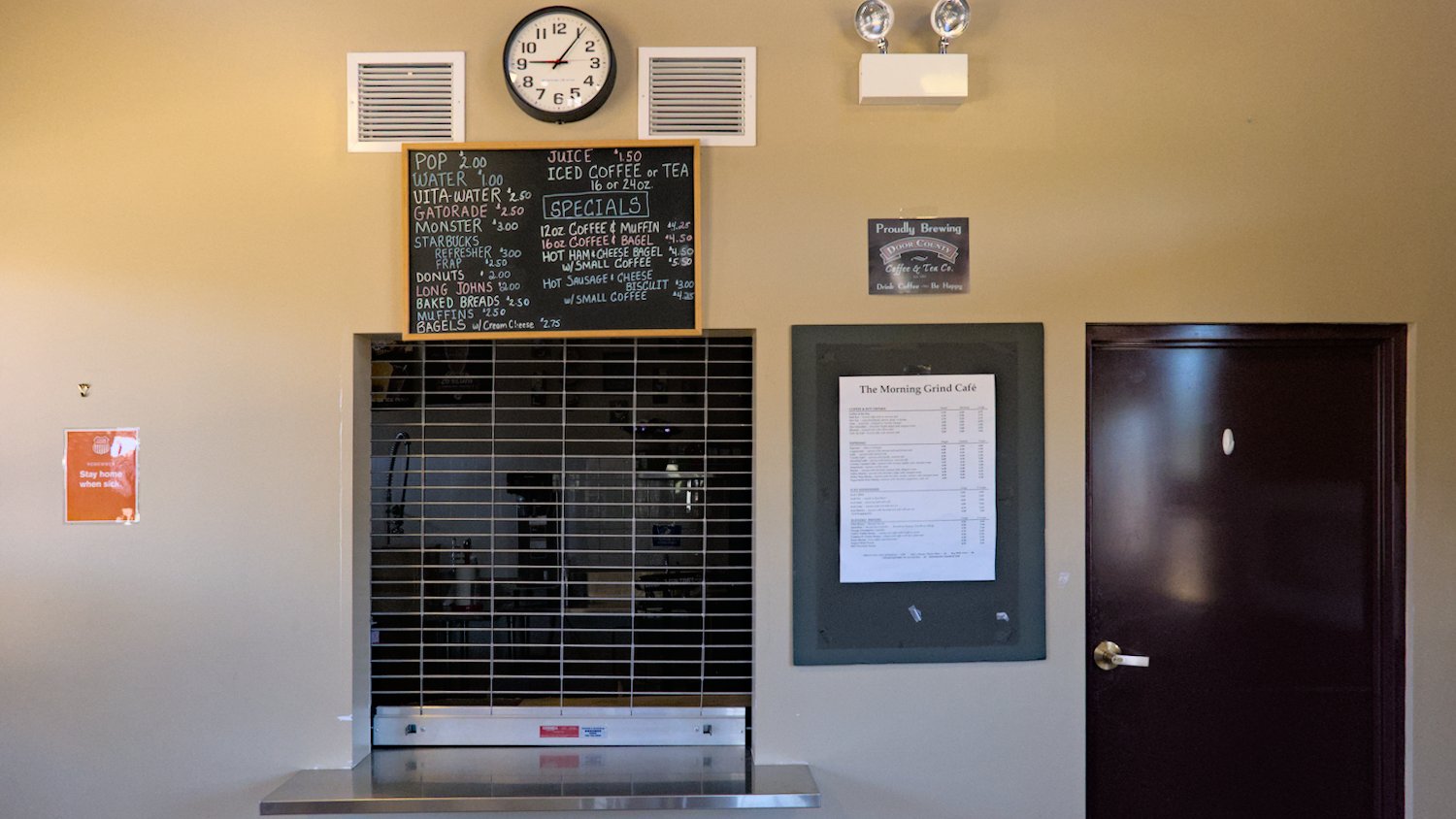Menu board for The Morning Grind Cafe inside the Fox River Grove Metra station.