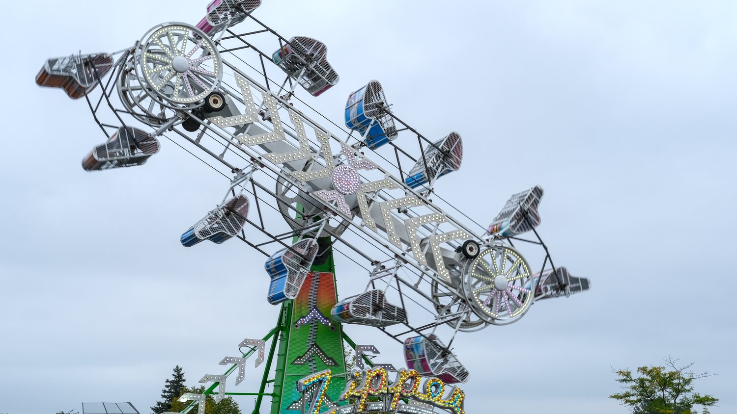 Zipper ride, spinning around in the air.