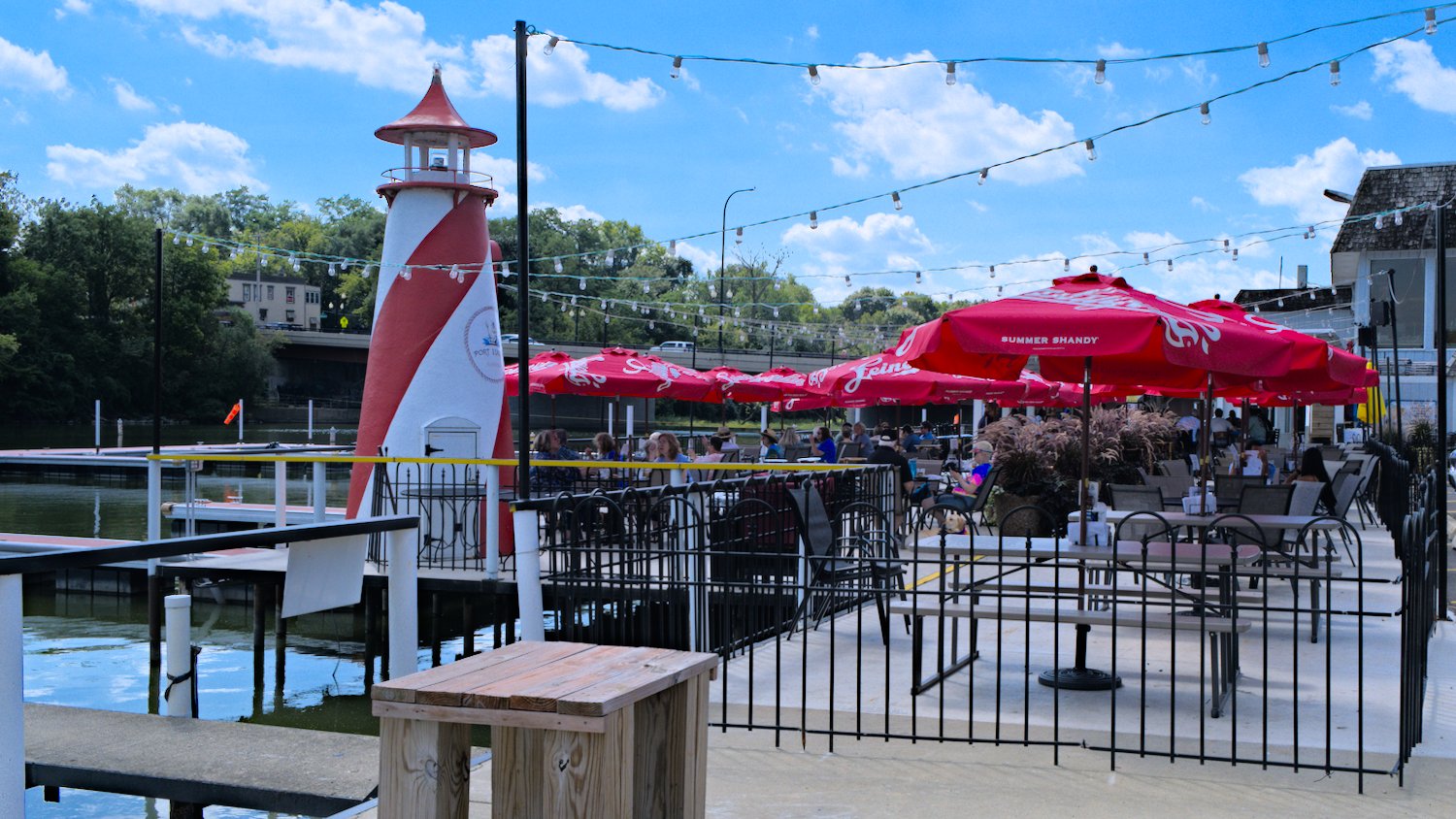 Diners on Port Edward's dockside patio on the Fox River.