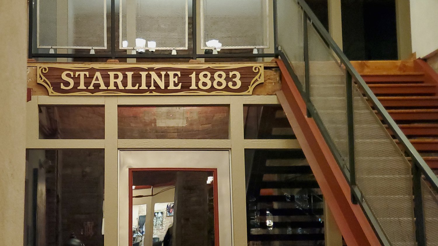 Starline 1883 sign.