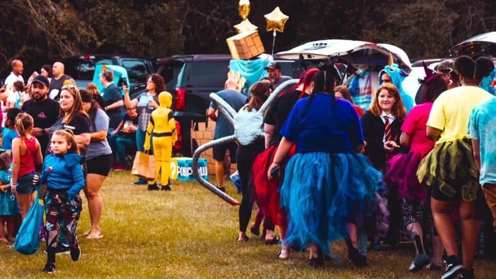 Trunk or treat event with people in costumes.