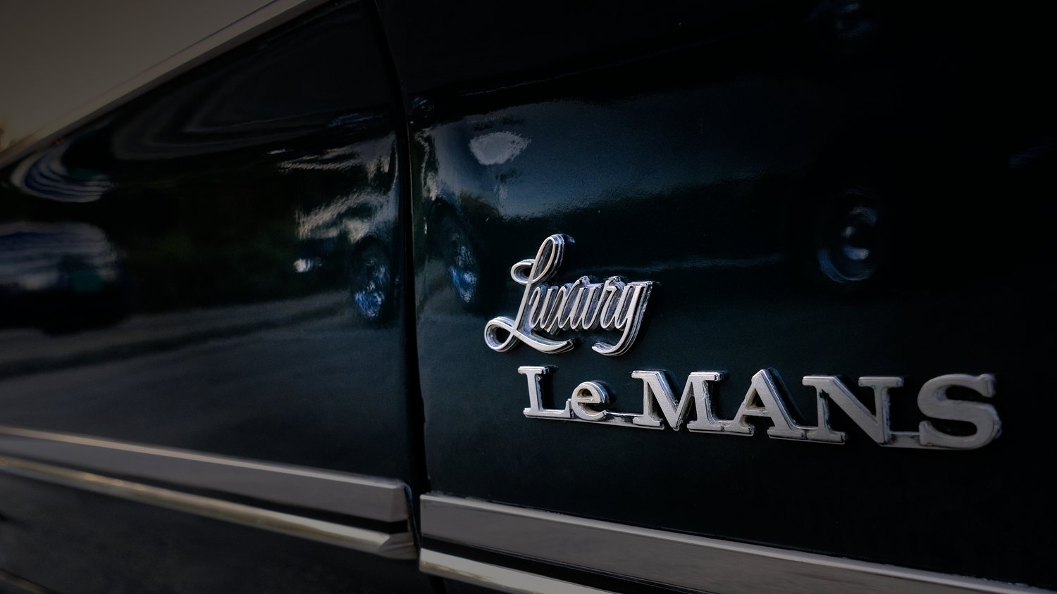 Luxury Le Mans badge.