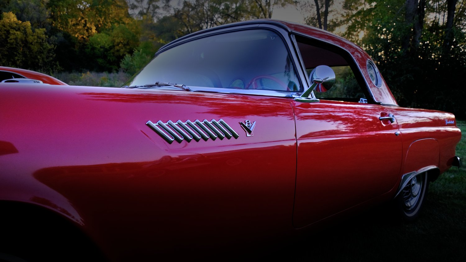 Shiny red vintage Thunderbird.