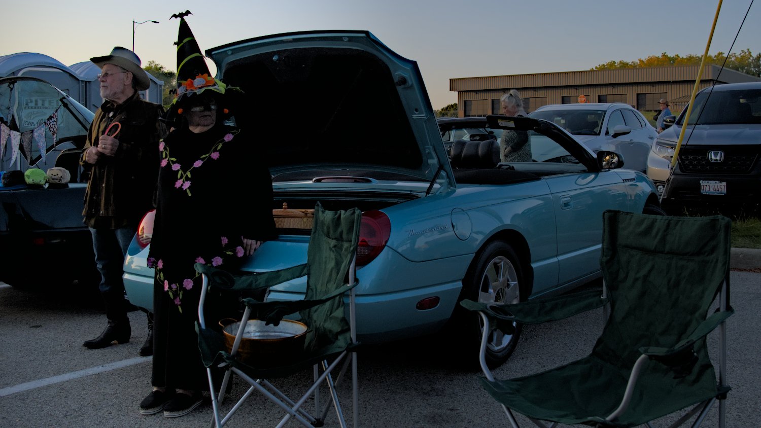 Trunk or treat car owners ready for trick or treaters.