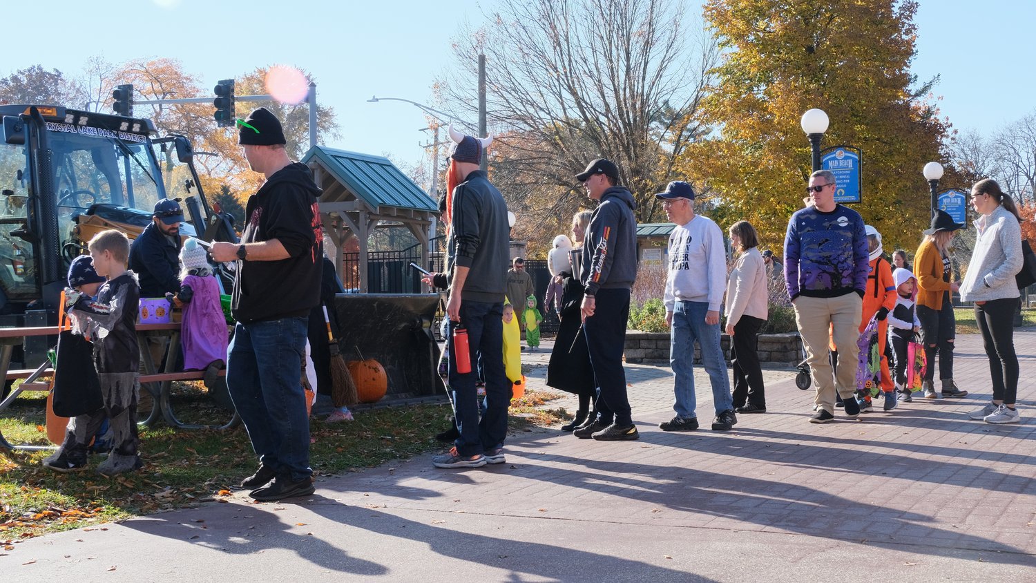 Trick-or-treaters lined up at the Crystal Lake Park District's touch-a-truck-trick-or-treat.