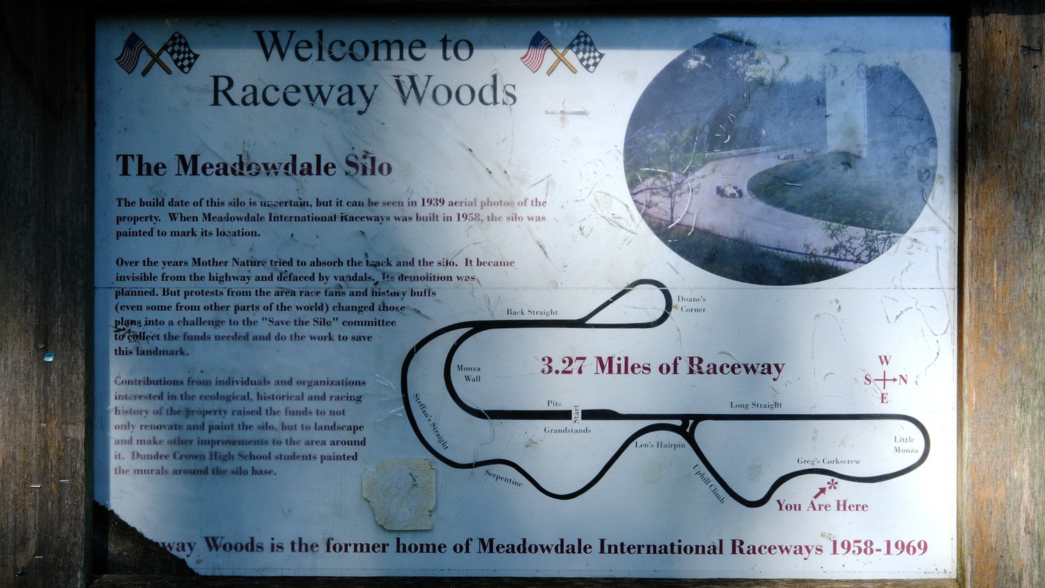 Raceway Woods sign and map.