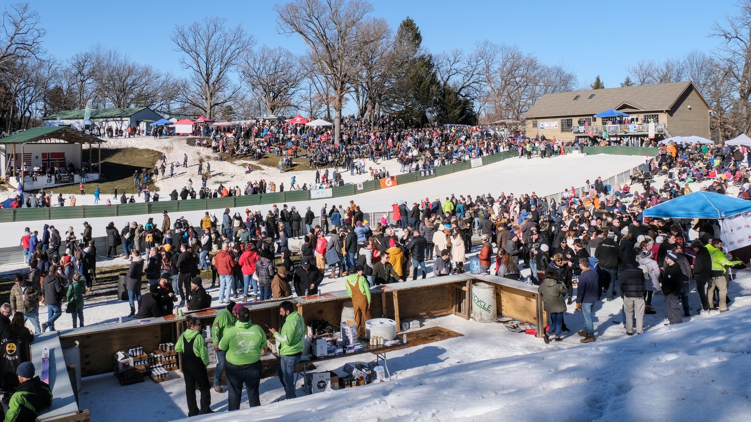 Crowd enjoying a break before K70 at the 118th annual Norge Ski Club, winter tournament, 2023.