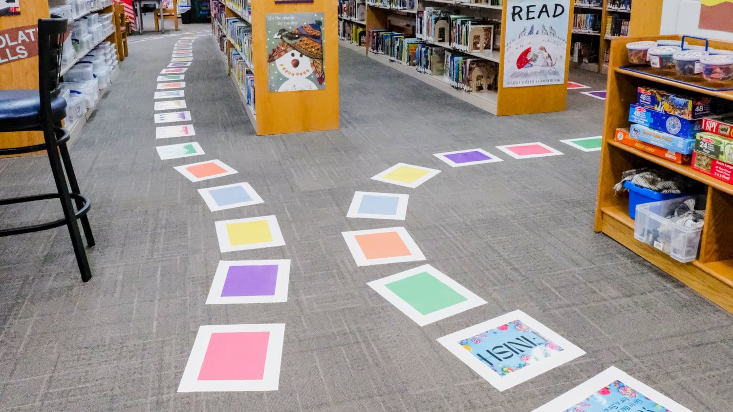 Life-sized Candyland game setup on the library floor for Library Lovers Expedition.