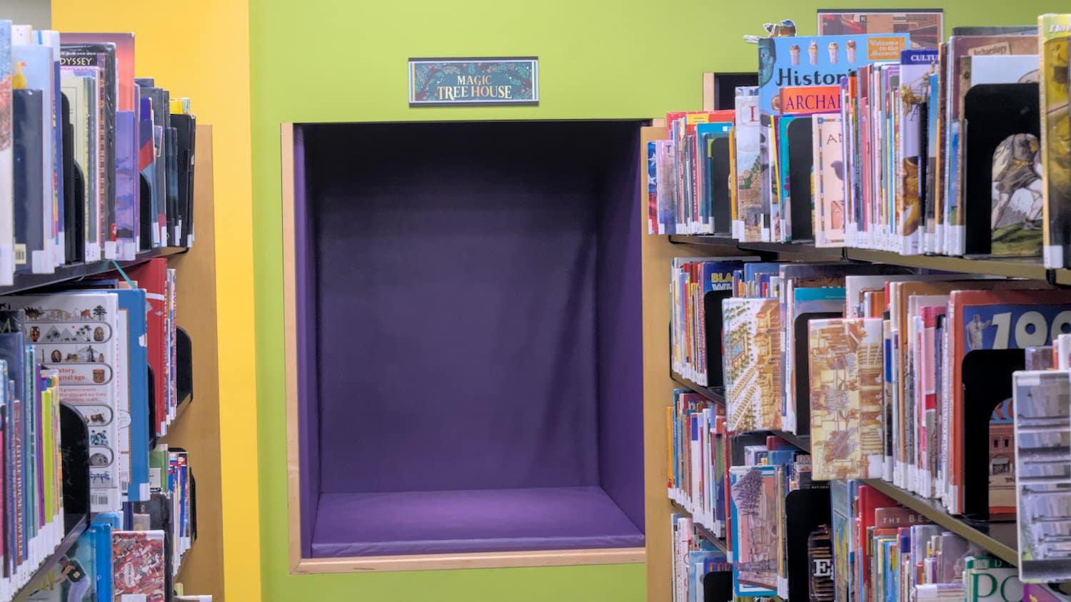 Cubby space for kids to read.