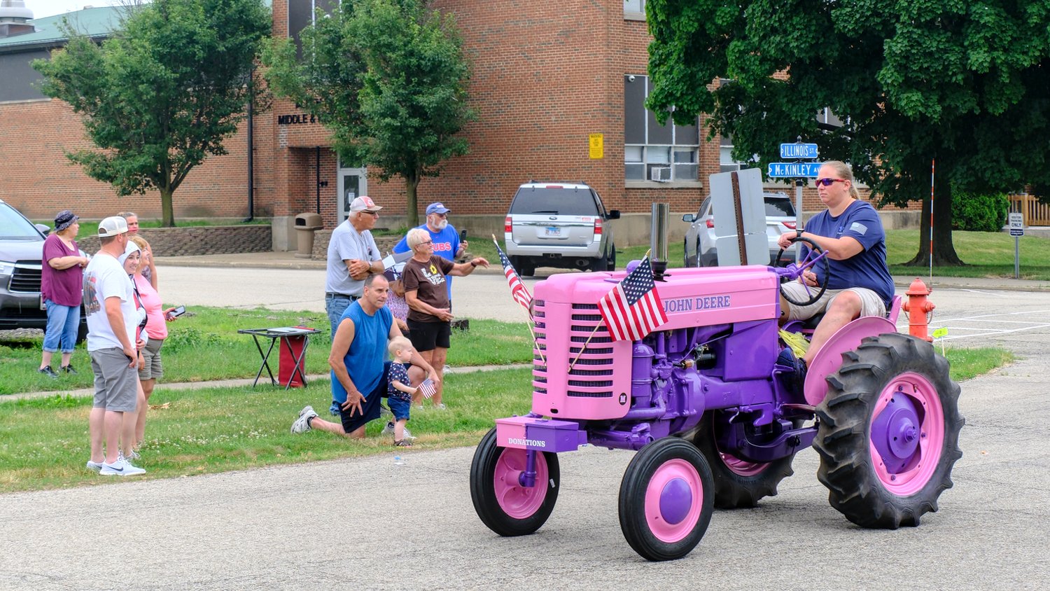 Pink and purple John Deere Model M tractor.