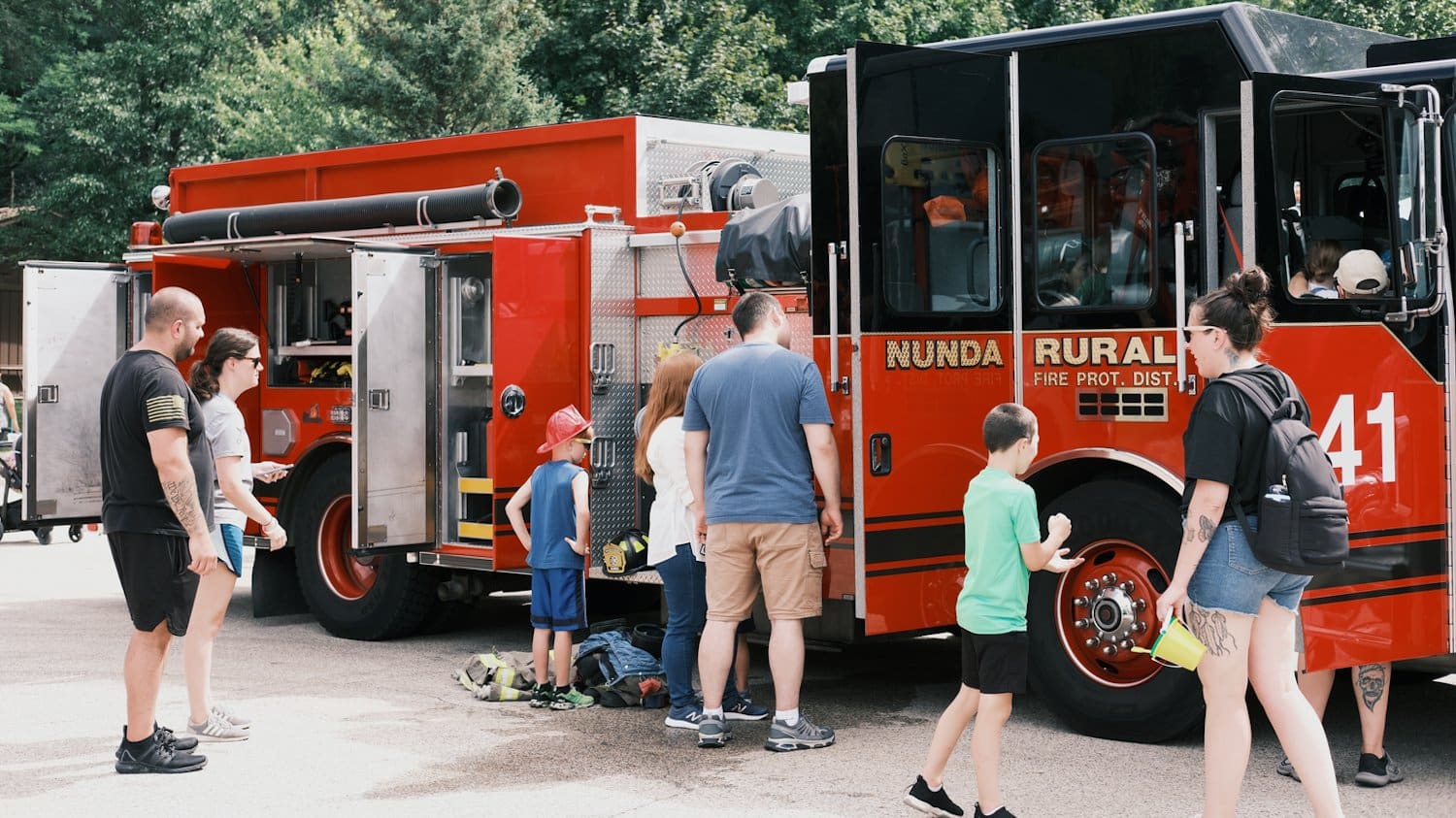 Kids checking out the fire engine and equipment.