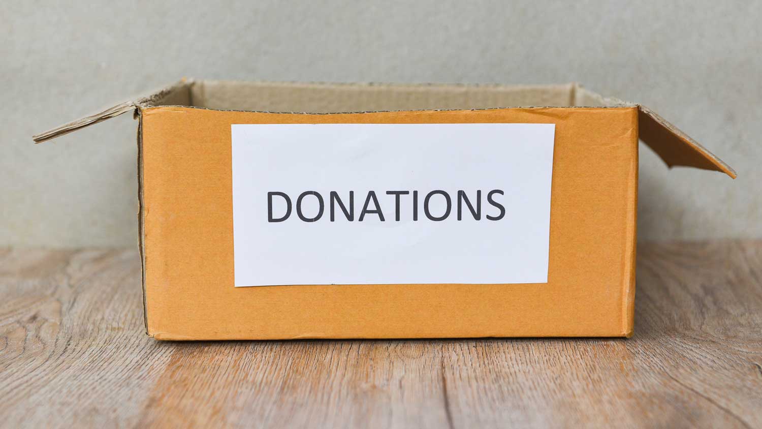 Cardboard box with Donations label.