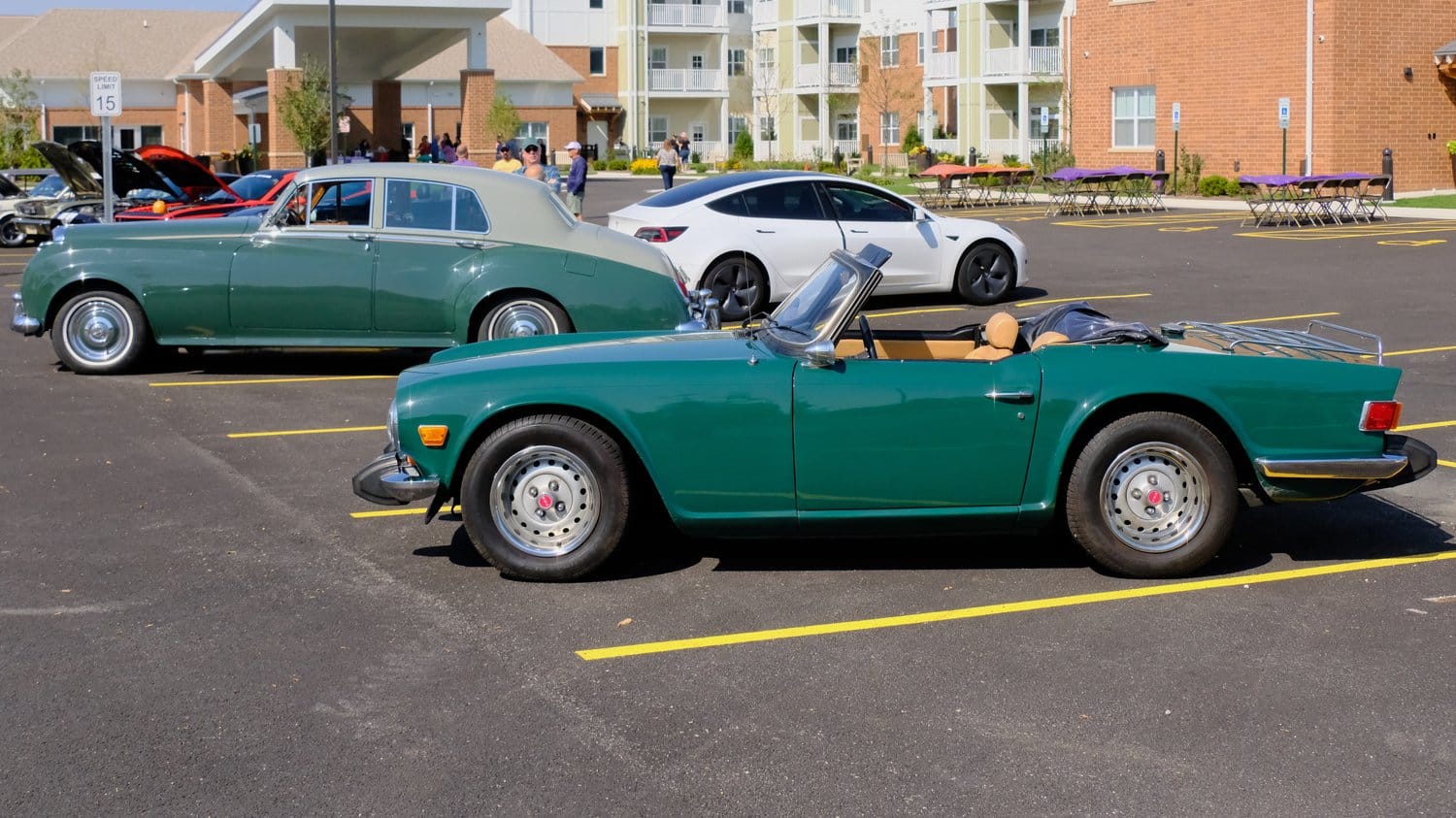 Green Triumph and a two-tone green Bentley.