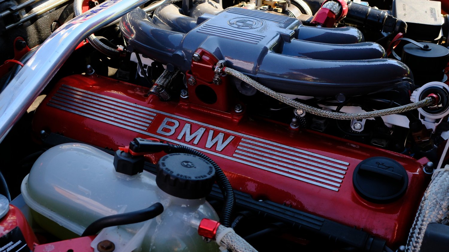 Engine compartment of 1987 BMW 325i.