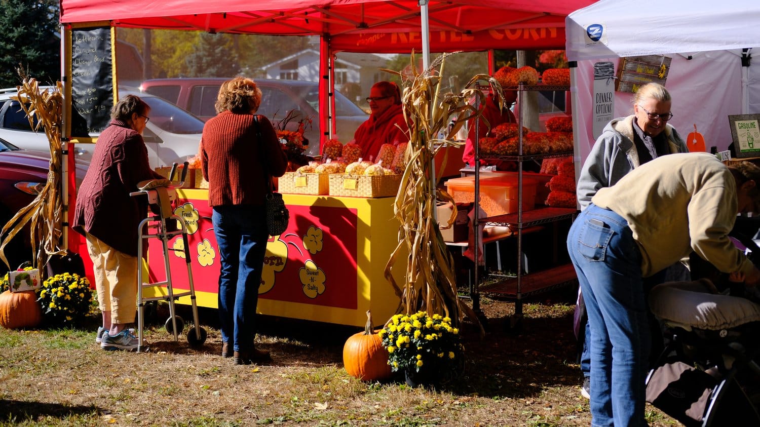 Customers at the kettle corn tent.