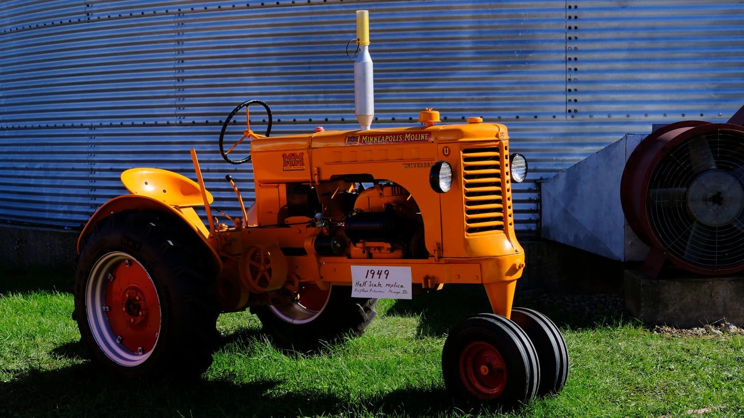 Half scale replica of a 1949 Minneapolis Moline tractor.