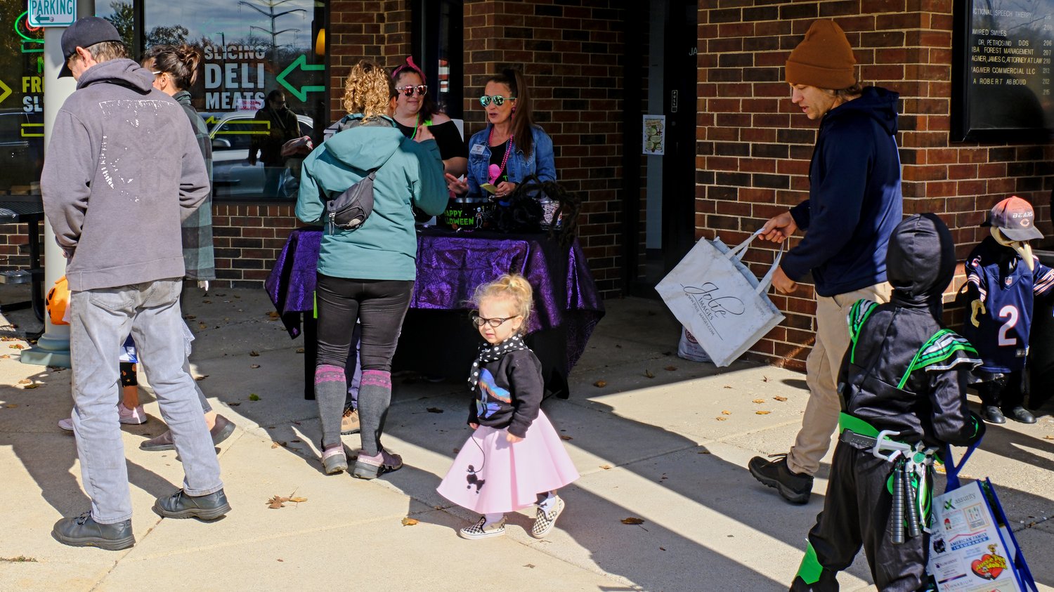 Trick-or-treaters at a strip mall in Fox River Grove.