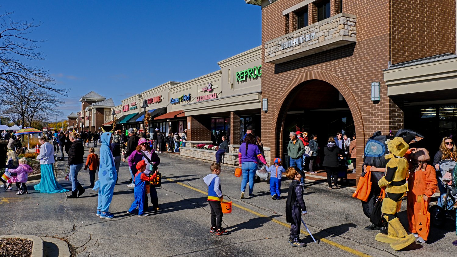 Trick-or-treaters attending the Halloween Family Event at Crystal Lake Plaza.