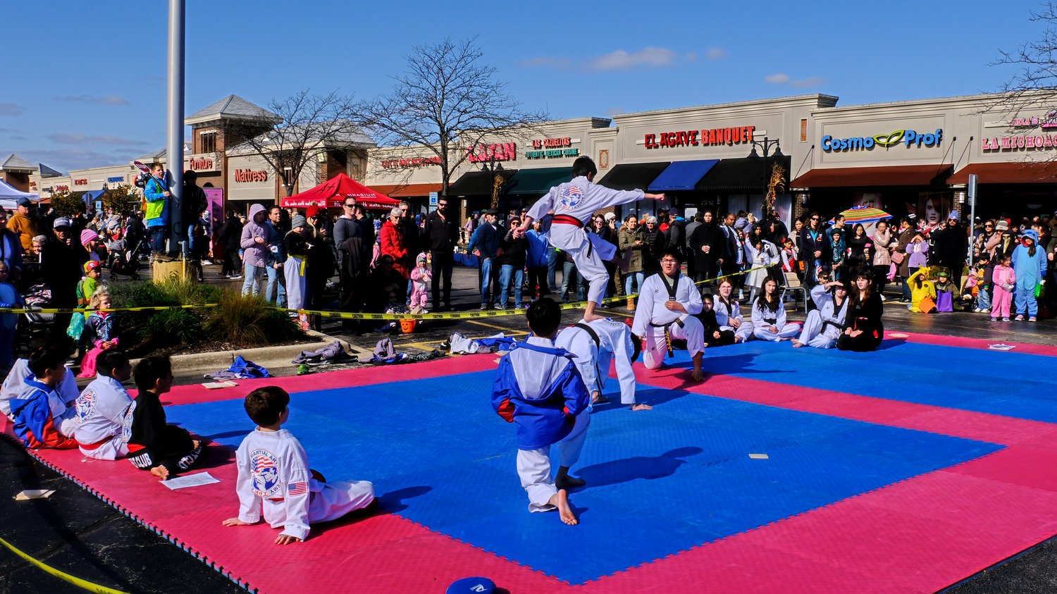 Lee's Martial Arts Demo team having a girls vs. boys competition.