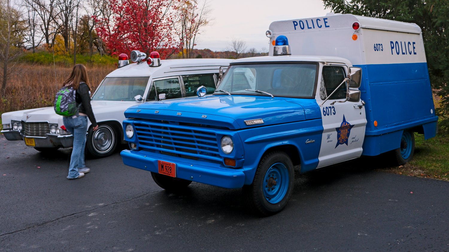 Antique police truck and ambulance.