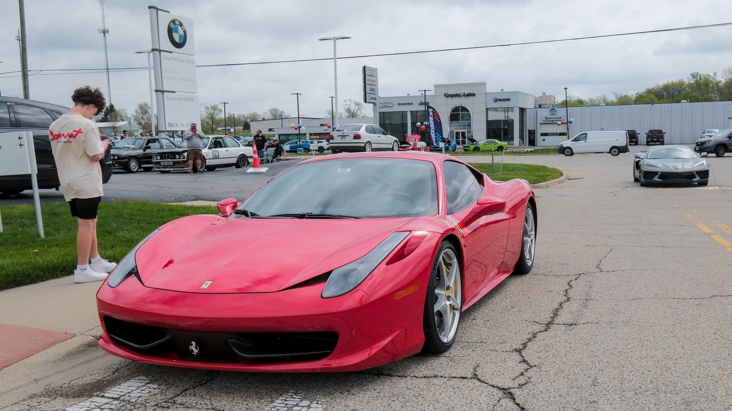 Ferrari parked in the street.